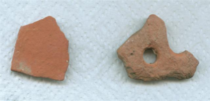 Pieces of red clay pottery retrieved from Lothal.